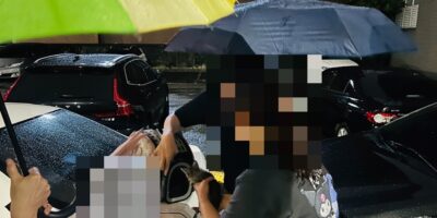 ▲圖說：員警與熱心民眾一起救援，將幼貓從汽車引擎室中救出 （圖／台中市政府 提供）